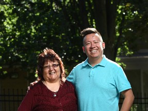 Lila Bruyere, 61, and her son, Shawn Johnston, 37, fought back from addictions and will become the first mother-son duo to graduate from the same program at Wilfrid Laurier University in Waterloo, Ont. They will both receive their master’s degrees from the faculty of social work’s aboriginal field of study program on Oct. 31, 2014. (Mat McCarthy/Wilfrid Laurier University/Handout/QMI Agency)