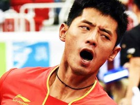 China's newly-crowned World Cup winner Zhang Jike reacts after winning the table tennis World Cup final against Ma Long on October 27, 2014 in Duesseldorf. (AFP PHOTO / DPA / HENNING KAISER / GERMANY OUT)