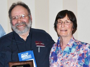 Peter Kudelka (left) and wife Thelma proudly display his lifetime achievement award he was recently presented from the Hoof Trimmers Association in Milwaukee, Wisconsin. SUBMITTED PHOTO