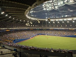 The crowd in the stadium during the baseball match of the Blue Jays (Toronto) vs the Mets (Toronto) at the olympic stadium, Montréal march 29th 2014. (JOEL LEMAY/QMI AGENCY)