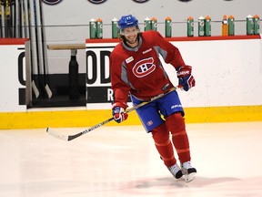 Tom Gilbert practices with the Montreal Canadiens on Oct. 21, 2014. QMI Agency.