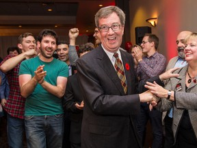 Jim Watson greeted by supporters after being elected again as Mayor of Ottawa on October 27, 2014. Errol McGihon/Ottawa Sun/QMI Agency
