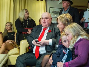 Rob Ford watches the election results come in at his mother Diane's home in Toronto, ON. on Monday, October 27, 2014. (ERNEST DOROSZUK/Toronto Sun)