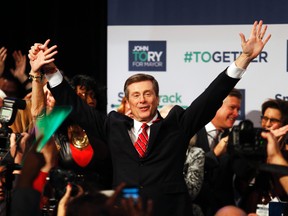 John Tory celebrates his victory in the Toronto mayoral election, Oct. 27, 2014. (CRAIG ROBERTSON/QMI Agency)