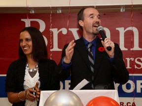 Mayor-elect Bryan Paterson, with his wife Shyla at his side, makes his celebration speech to supporters at his campaign headquarters Monday night. (Ian MacAlpine/The Kingston Whig-Standard)