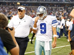 Dallas Cowboys quarterback Tony Romo (9) walks off the field after the game against the Washington Redskins at AT&T Stadium. The Redskins beat the Cowboys 20-17 in overtime on Oct 27, 2014 in Arlington, TX, USA. (Matthew Emmons-USA TODAY Sports)