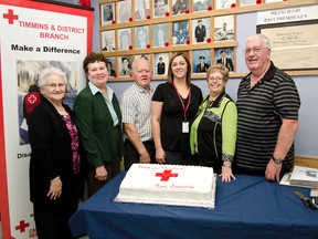 Red Cross volunteers Yolande Genier, Denise Schmidt, Andre Thomas, Helene Genier, Roy Telford pose with Melissa Foy from the Cochrane Red Cross during the Annual Red Cross Volunteer Supper held last Tuesday at the Legion here.