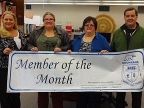 Denise Tremblay, Executive Director Adult Learning Centre Sara Haldenby, Instructor Claudette Markus and Paul Blanchard, Board Of Trade Director pose with after the Adult Learning Centre was named Member of the Month for September by the Cochrane Board of Trade.