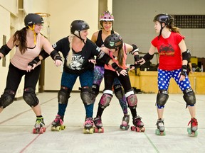 Members of the Cochrane Derby Gurlz roller derby team practice at Apitsawin.