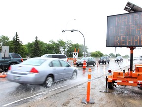 Traffic on the Nairn Avenue overpass during construction in June. Work on the bridge has been completed, city officials announced Tuesday. (Kevin King/Winnipeg Sun file photo)