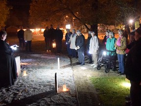 Laurel Beechey presented Halloween History Tour at the Pioneer Cemetery in Tillsonburg Friday and Saturday night. (CHRIS ABBOTT/TILLSONBURG NEWS)