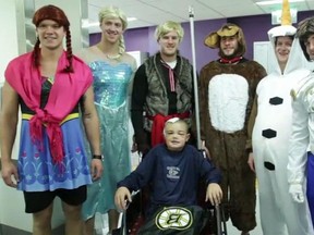 Bruins players, dressed up as characters from the Disney movie Frozen, took time out of their busy hockey schedule to meet with kids going through a tough time at Boston Children's Hospital on Monday. (Bruins TV)