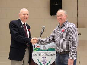 HEATHER ARMSTRONG/SPECIAL TO THE CORNWALL STANDARD-FREEHOLDER/QMI AGENCYSouth Glengarry Township mayoral candidates Dave McDonald (L) and Ian McLeod (R) shake hands before the results were announced in Williamstown on Monday, Oct. 27, 2014, that declared McLeod would remain mayor of South Glengarry.