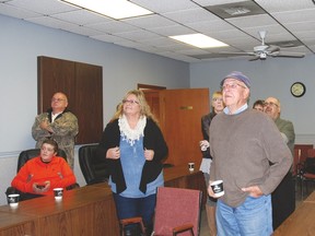 West Elgin candidates watch the election results as they are posted in the West Elgin council chambers Monday.