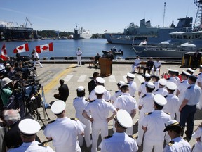 Canadian Prime Minister Stephen Harper announces the construction of up to eight Polar Class 5 Arctic Offshore Patrol Ships and the establishment of a deep water port in the far North, at Esquimalt Naval Base, British Columbia, July 9, 2007. (REUTERS/Lucy Nicholson)