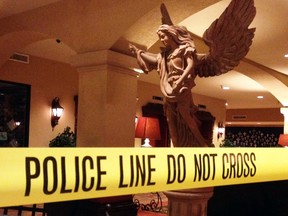 Police tape is seen in the lobby of the Hotel Encanto in Las Cruce, N.M., in this handout photo provided by the Las Cruces Police Departmen and taken Oct. 28, 2014 (DAN TRUJILLO/Reuters/Las Cruces Police Department/Handout)