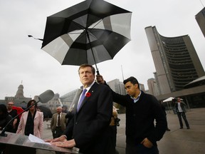 Toronto Mayor-elect John Tory holds a press conference outside City Hall Tuesday October 28, 2014. (Stan Behal/Toronto Sun)