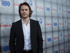 Cast member Taylor Kitsch poses at a premiere for the HBO television movie "The Normal Heart" in Beverly Hills, California May 19, 2014. The movie opens in the U.S. on May 25.  REUTERS/Mario Anzuoni
