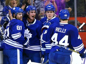 Tyler Bozak (second from left) and teammates celebrate his goal against the Sabres on Tuesday night at the ACC. (Dave Abel/Toronto Sun)