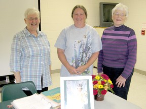 Cindy Cartwright, centre, of the Ontario Hummingbird Project was guest speaker at the Ripley Agricultural Society open meeting held at the Ripley Community Centre on Oct. 15, 2014. Ripley Horticultural Society's Ann Finlayson and Shirley Harris, stand with Cindy Cartwright. (VALERIE GILLIES/LUCKNOW SENTINEL)
