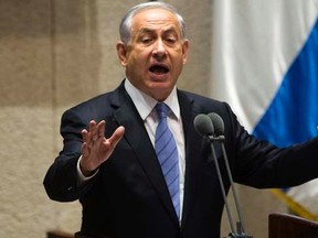 Israel's Prime Minister Benjamin Netanyahu speaks at the opening of the winter session of the Knesset, the Israeli parliament, in Jerusalem October 27, 2014.   REUTERS/Ronen Zvulun