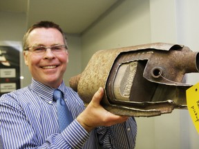 Rob Bouma, vice-president of Shattercone Metallurgical Inc. displays a catalytic converter that contains precious metals.