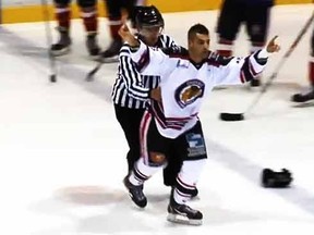 Guillaume Coude celebrates his easy fighting victory over Dylan Garrioch in the LNAH. (YouTube screen grab)