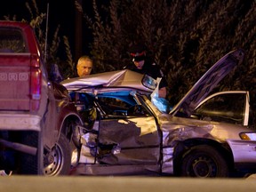 Police investigate after a fatal crash at Whitemud Drive at the 215 Street intersection in Edmonton, Alta. on  Sunday, September 15, 2013. EDMONTON SUN FILE