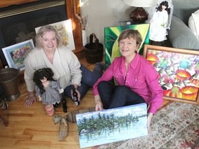 Nona Mariotti, left, and Jean Hodgson show some of the items that will be on sale during a Market for Africa Nov. 1 by Kingston Grandmother Connection, a group helping grandmothers in Lesotho who are raising grandchildren whose parents died of AIDS. (Michael Lea/The Whig-Standard)