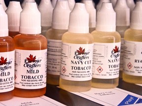 A closeup of e-liquids available in kingston ranging from 0 to 24 milligrams of nicotine. Many flavours mimic estabished cigarette brands. (Sam Cooley/The Whig-Standard)