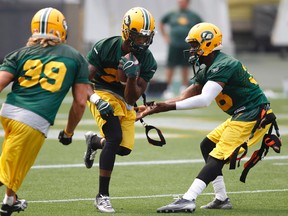 Since Joe Burnett, centre, was placed on the IR after Week 7 a number of teammates have stepped up to fill the void. (Ian Kucerak, Edmonton Sun)
