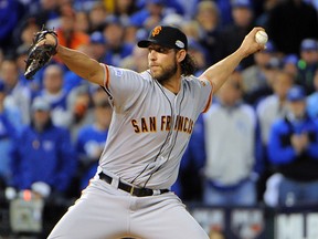 Madison Bumgarner throws during Game 7 of the World Series on Wednesday night. (USA Today Sports)
