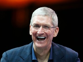 Apple CEO Tim Cook speaks at the WSJD Live conference in Laguna Beach, Calif., Oct. 27, 2014.  REUTERS/Lucy Nicholson