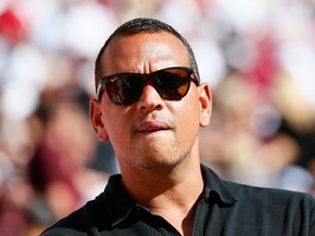 Alex Rodriguez of the New York Yankees stands on the field prior to the game between the Alabama Crimson Tide and the Texas A&M Aggies at Bryant-Denny Stadium on October 18, 2014 in Tuscaloosa, Alabama.  (Kevin C. Cox/Getty Images/AFP)