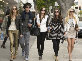 Emma Watson, Katie Chang, Israel Bourssard, Claire Julien and Taissa Farmiga in a movie still from 'The Bling Ring.' The film is based on a true story about teenagers who stole millions of dollars in clothing from celebrities' Hollywood homes. (Handout)