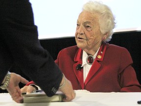 Outgoing Mississauga Mayor Hazel McCallion signs copies of her new book at the Dante Club in Sarnia. She was a keynote speaker at this year's Sarnia-Lambton Business Week. McCallion, 93, didn't seek re-election this year after serving as mayor since 1978. TYLER KULA/ THE OBSERVER/ QMI AGENCY