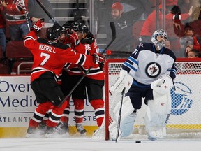 The Jets couldn't hold on to their one-goal lead over the Devils on Thursday. (BRUCE BENNETT/AFP)