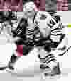Ottawa Senators' Curtis Lazar loses the draw to Chicago Blackhawks' Jonathan Toews during NHL hockey action at the Canadian Tire Centre in Ottawa, Ontario on Thursday October 30, 2014. Errol McGihon/Ottawa Sun/QMI Agency