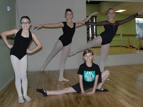 Studio Dance Pointe students Lauren Martin, left, Camryne Quinn, Parker Merucci (crouching) and Mackenzie Killough strike a pose at a recent gathering at the St. Thomas studio. All four students will be taking part in a production of The Nutcracker at Centennial Hall in London in December.

Ben Forrest/Times-Journal