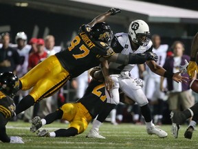 The Hamilton Tiger-Cats’ defence has had Ottawa RedBlacks quarterback Henry Burris’ number so far this season with two victories.
(Tom Szczerbowski/Getty Images)