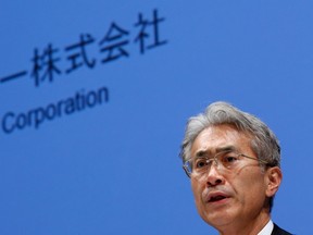 Sony Corp's chief financial officer Kenichiro Yoshida speaks during a news conference in Tokyo May 14, 2014. REUTERS/Toru Hanai