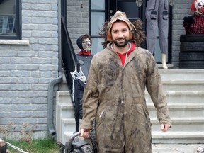 Mathieu Cass has decorated his home with bloody dolls and skulls and has shocked the neighborhood of Saint-Jean-sur-Richelieu. October 31, 2014. (MARIE-EVE DUMONT/QMI AGENCY)