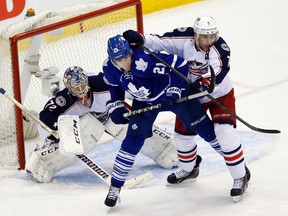 Toronto's James van Reimsdyk is covered by Columbus' Jack Johnson in front of goalie Sergei Bobrovsky at the Air Canada Centre in Toronto on Monday March 3, 2014. (Michael Peake/Toronto Sun)