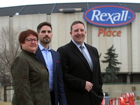 R-L Tim Reid, President and CEO of Northlands, Andrew Ross, Chair of the Arena Strategy Committee, and Laura Gadowsky, Chair of Northlands Board of Directors speaks to the media. Edmonton Northlands announce their plans for the future of Rexall Place in Edmonton, AB. on Friday, Oct 31, 2014.  Perry Mah/Edmonton Sun