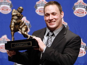 JC Sherritt of the Edmonton Eskimos wins CFL's Most Outstanding Defensive Player in Toronto on November 22, 2012. Photo by Dave Abel/Toronto Sun/QMI