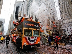 San Francisco Giants manager Bruce Bochy waves to fans at the World Series parade. (USA Today Sports)