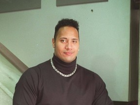 Dwayne 'The Rock' Johnson - then known as Rocky - poses as a SUNshine Boy in 1997. (Photo: Kate ​MacConnell, QMI Agency)