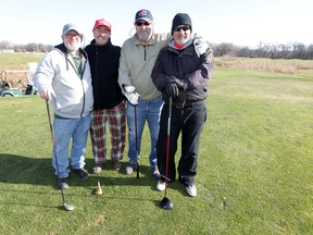 From the left; Tracy Dunn, Ted Durussel, Tom Dudar and Dave Storozuk.  Bob Dunn had always played with three of these guys, until he passed away in 1993.  Tracy Dunn is now the fourth member of the group.  They play at Shooters Golf Course on Main Street Saturday, Nov. 1, 2014.