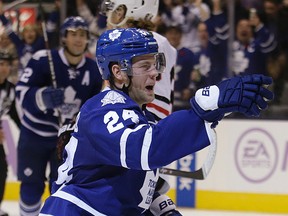 Maple Leafs centre Peter Holland celebrates his goal against the Chicago Blackhawks on Saturday night  at the Air Canada Centre. It proved to be the game-winner. (Craig Robertson/Toronto Sun)