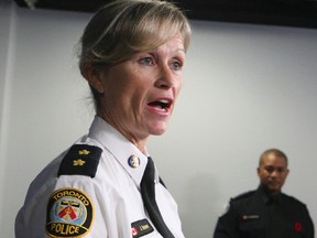 Insp. Joanna Beavan-Desjardins of the Toronto force's sex crimes unit speaks to reporters on Saturday, Nov. 1, 2014. (VERONICA HENRI/Toronto Sun)